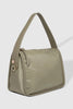 Milan Nylon Crossbody Bag - Khaki-Louenhide-The Louenhide Milan Khaki Nylon Crossbody Bag effortlessly combines an elevated minimal aesthetic with everyday functionality. This stylish, convertible crossbody bag features an adjustable and detachable sateen guitar strap and a comfortable vegan leather shoulder strap, which tucks securely under the bag with a press stud closure when not in use. Lightweight and durable, the nylon material compliments an urban, street style aesthetic while remaining reliable for