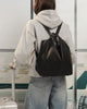 Miley Convertible Backpack - Black-Louenhide-The Miley Black Convertible Backpack is designed for days that shift between plans, places, and moods. A modern essential, she redefines the everyday with a sense of ease and understated polish. Miley Black adapts as your itinerary unfolds, worn on the shoulder or styled as a backpack with her convertible straps, making her the perfect travel backpack for women on the move. Her softly structured silhouette balances polish with ease, while the smooth vegan leathe