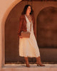 Millie crossbody bag - caramel-Louenhide-In a new, improved size! The Louenhide Millie Caramel Crossbody Bag is a timeless and functional everyday bag, designed to keep you organised and stylish throughout your day. Divided into two functional compartments, this casual crossbody bag provides the perfect solution for keeping your essentials neatly organised. Finished in a smooth vegan leather exterior, this women's crossbody bag is ready to withstand daily wear and tear, ensuring it remains a reliable compan