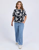 Mimosa Tee - Black Print-Elm-Redefine comfort and chic with the Mimosa Tee, made for layering or wearing solo. This piece is pure Elm: playful, polished, and practical. Exclusive Elm print Slide Splits Drop shoulder Organic Cotton Jersey Model is 171cm and wears Size 10-Pash + Evolve