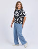 Mimosa Tee - Black Print-Elm-Redefine comfort and chic with the Mimosa Tee, made for layering or wearing solo. This piece is pure Elm: playful, polished, and practical. Exclusive Elm print Slide Splits Drop shoulder Organic Cotton Jersey Model is 171cm and wears Size 10-Pash + Evolve