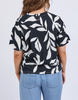 Mimosa Tee - Black Print-Elm-Redefine comfort and chic with the Mimosa Tee, made for layering or wearing solo. This piece is pure Elm: playful, polished, and practical. Exclusive Elm print Slide Splits Drop shoulder Organic Cotton Jersey Model is 171cm and wears Size 10-Pash + Evolve
