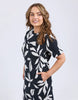 Mimosa Tee Dress - Black Print-Elm-Fresh and bold this exclusive Mimosa Print has been designed by our in-house Elm designers and complements the new Mimosa Tee Dress beautifully. The print takes the effortless comfort of a tee dress and makes it a stylish must-have. Exclusive Elm print Slide Splits Regular Tshirt dress fit Organic Cotton Jersey Model is 171cm and wears Size 10-Pash + Evolve