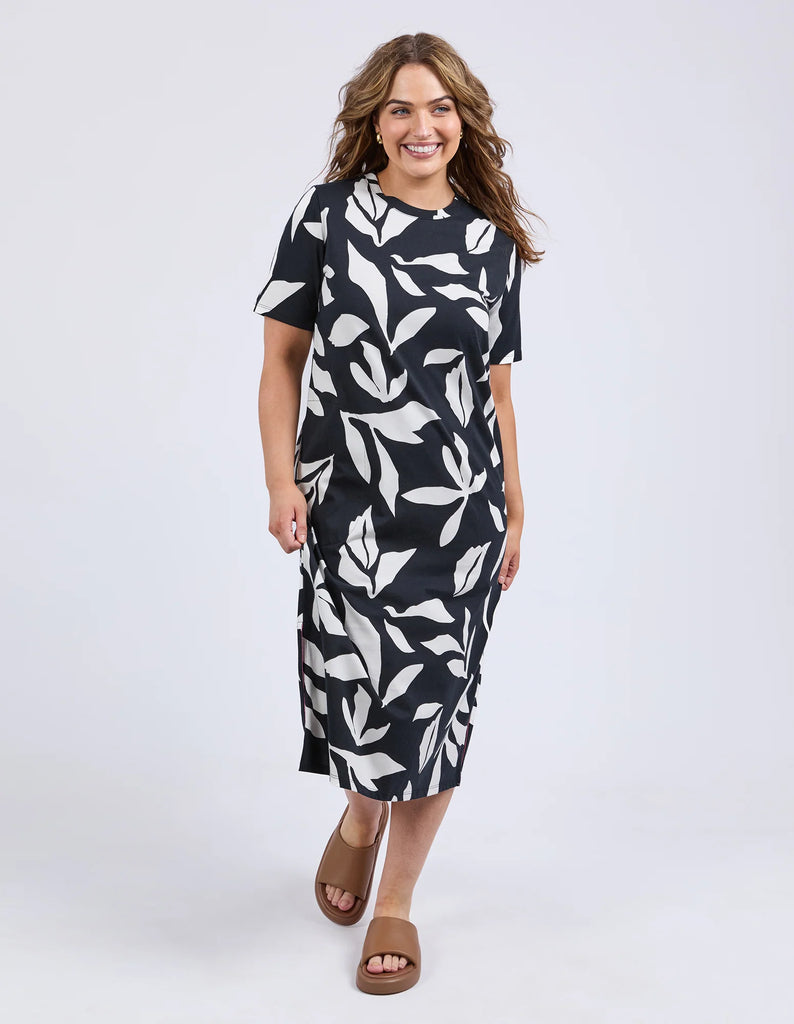Mimosa Tee Dress - Black Print-Elm-Fresh and bold this exclusive Mimosa Print has been designed by our in-house Elm designers and complements the new Mimosa Tee Dress beautifully. The print takes the effortless comfort of a tee dress and makes it a stylish must-have. Exclusive Elm print Slide Splits Regular Tshirt dress fit Organic Cotton Jersey Model is 171cm and wears Size 10-Pash + Evolve