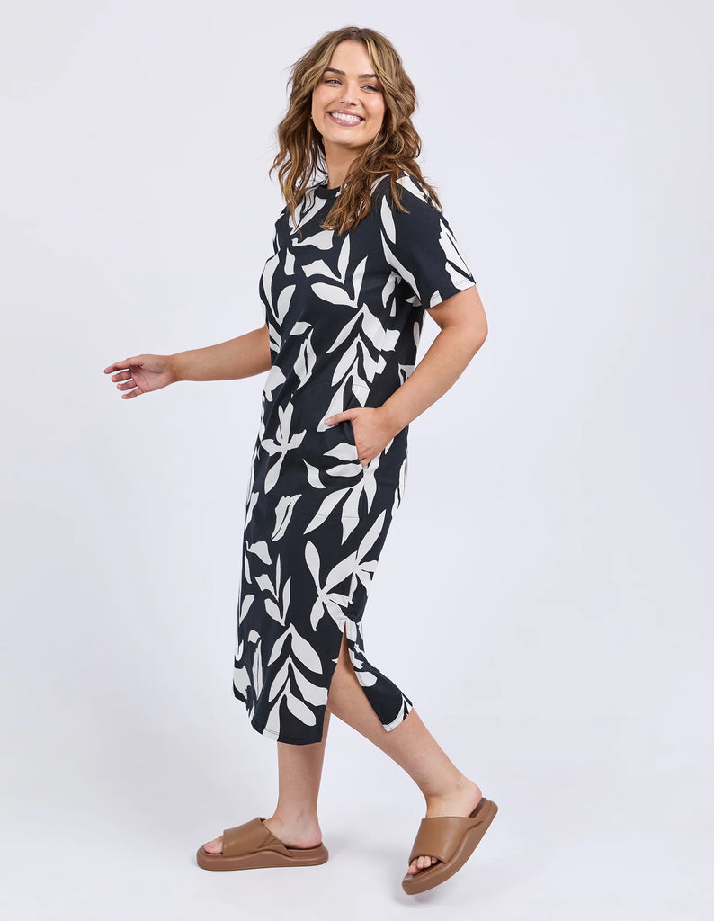 Mimosa Tee Dress - Black Print-Elm-Fresh and bold this exclusive Mimosa Print has been designed by our in-house Elm designers and complements the new Mimosa Tee Dress beautifully. The print takes the effortless comfort of a tee dress and makes it a stylish must-have. Exclusive Elm print Slide Splits Regular Tshirt dress fit Organic Cotton Jersey Model is 171cm and wears Size 10-Pash + Evolve