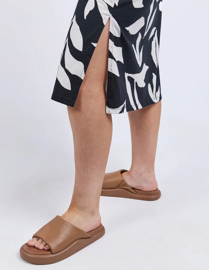 Mimosa Tee Dress - Black Print-Elm-Fresh and bold this exclusive Mimosa Print has been designed by our in-house Elm designers and complements the new Mimosa Tee Dress beautifully. The print takes the effortless comfort of a tee dress and makes it a stylish must-have. Exclusive Elm print Slide Splits Regular Tshirt dress fit Organic Cotton Jersey Model is 171cm and wears Size 10-Pash + Evolve