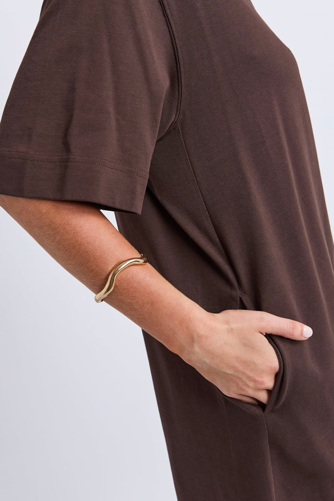 Mish Dress - Coffee-Elm-The Mish Dress is your throw-on-and-go wardrobe hero. Crafted from soft cotton rugby jersey with practical side pockets and a classic T-shirt silhouette, it's the perfect everyday dress for busy days, weekends and travel. Classic T-shirt dress Side pockets Knee length Relaxed fit 100% Cotton Rugby Jersey The Model is 173cm and is wearing a size 10-Pash + Evolve