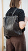 Mollie backpack - black-Baleka Leather-Effortlessly stylish and thoughtfully designed, the Mollie Backpack combines modern functionality with timeless design. Made from Genuine leather, this versatile piece is perfect for everyday use, travel or work. Designed with security and comfort in mind, the bags main opening sits neatly against your back when worn, keeping your belongings close and protected! Main opening sits against your back for added security Internal slip pocket and zip compartment External sid