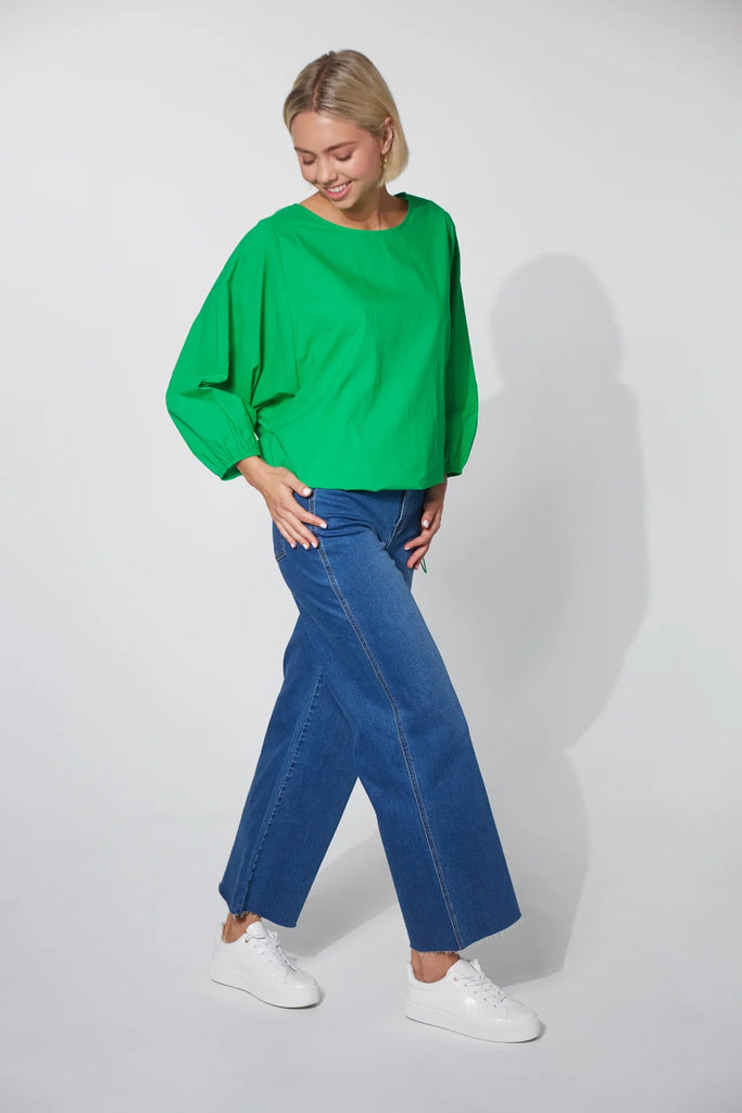 Montrose Top - Evergreen-HAVEN-Meet the Montrose Top, a testament to versatility. Perfect for a polished office look with trousers or a chic, casual ensemble paired with your favourite denim. Crafted from soft and durable cotton poplin, it provides a luxurious feel. The batwing sleeves and bubble hem with an elastic toggle add bold flair, making it a stylish choice for any occasion. Round neck Batwing sleeve with elastic cuff Bubble hem with elastic toggle Easy fit 100% Cotton XS/S, S/M, M/L, L/XL-Pash + Ev