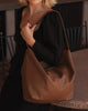 Morgan shoulder bag - caramel-Louenhide-The Louenhide Morgan Caramel Shoulder Bag brings a bold sense of ease to your everyday. With its slouchy, oversized silhouette and subtle studded detailing, this hobo shoulder bag makes a statement without trying too hard. Designed for the throw-and-go days, its laid-back shape pairs perfectly with lived-in denim, soft layers, and easy flowy dresses. Slung over your shoulder, the Morgan Caramel Shoulder Bag delivers effortless wearability and a softly structured finis