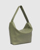 Morgan shoulder bag - sage-Louenhide-The Louenhide Morgan Sage Shoulder Bag brings a bold sense of ease to your everyday. With its slouchy, oversized silhouette and subtle studded detailing, this hobo shoulder bag makes a statement without trying too hard. Designed for the throw-and-go days, its laid-back shape pairs perfectly with lived-in denim, soft layers, and easy flowy dresses. Slung over your shoulder, the Morgan Sage Shoulder Bag delivers effortless wearability and a softly structured finish that fe