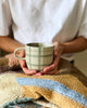 Mug single - duck egg check-Robert gordon-Hand-painted tartan, stripes, and gingham checks both inside and out make these mugs truly charming. We truly think they are the Cat’s Pyjamas. Available in 5 unique designs. Beautiful designs delicately hand painted inside and out. 350ml Capacity Microwave and Dishwasher safe Made from high fired stoneware-Pash + Evolve