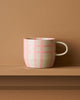Musk mug - cats pyjamas-Robert gordon-Our much-loved Cat’s Pyjamas mugs return with a fresh twist - now available in new seasonal colourways. Each mug is hand-painted with a playful mix of tartan, stripes, and gingham checks both inside and out. Beautiful designs delicately hand painted inside and out. 350ml Capacity Microwave and Dishwasher safe Made from high fired stoneware-Pash + Evolve