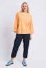 Nessa sweat - peach-Elm-Crafted from premium Australian cotton fleece, the Nessa Sweat features raglan sleeves and sporty taping details for an elevated casual look. Pair it with denim or lounge pants for everyday comfort. Raglan sleeves Rib at cuffs & hemband Taping at sleeves Relaxed fit 100% Australian Cotton Un-brushed Fleece The Model is 173cm and is wearing a size 10-Pash + Evolve