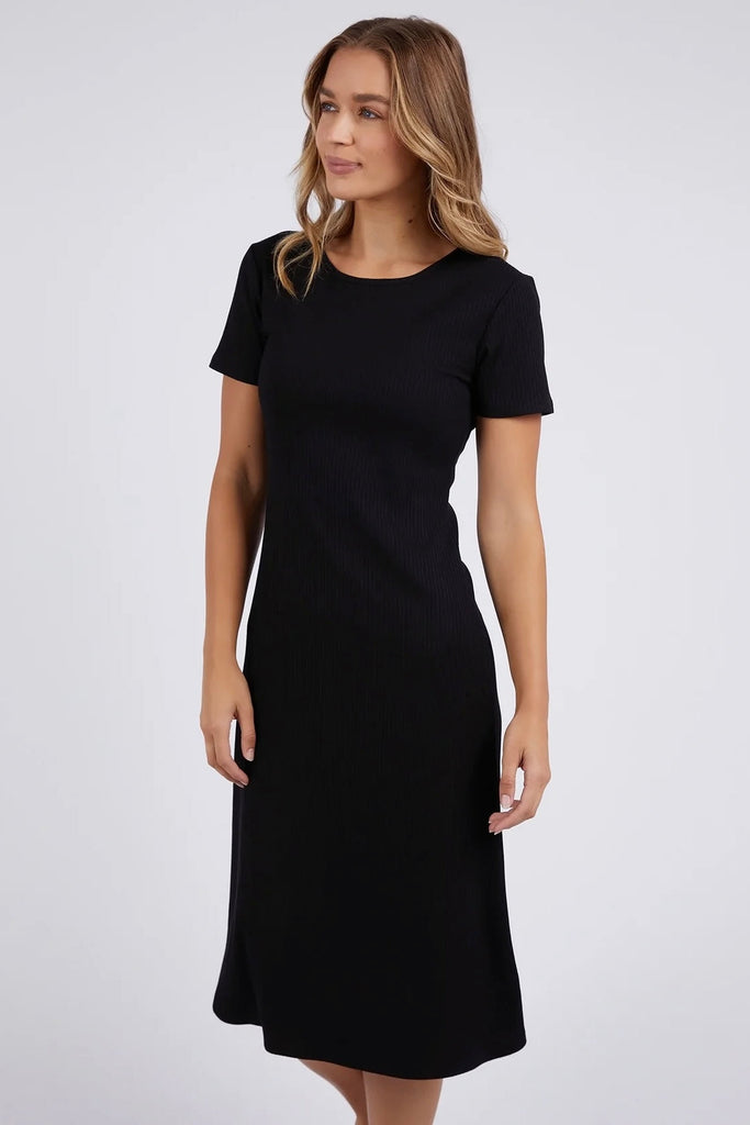 Neve Rib Dress - Black-Foxwood-Rib contoured fabrication is the ultimate in flattering fit. The new Neve Rib Dress in viscose elastane rib is a great midi-length for a dress when you're on the move as the fabric stretches with you and looks chic at all times. Round neckline Midi length Short sleeve Polyester Viscose Elastane Model is wearing a Size 10-Pash + Evolve