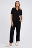 Neve Rib Pant - Black-Foxwood-Rib contoured fabrication is the ultimate in flattering fit. The new Neve Rib Pant in viscose elastane rib features pockets and an elastic waist. These pants are a great on-the-move option for casual and comfort + dressing. Pair with the Neve Rib Shirt for the ultimate luxe-lounge look. Relaxed fit Elastic waist Side pockets Polyester Viscose Elastane Model is wearing a Size 10-Pash + Evolve