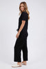 Neve Rib Pant - Black-Foxwood-Rib contoured fabrication is the ultimate in flattering fit. The new Neve Rib Pant in viscose elastane rib features pockets and an elastic waist. These pants are a great on-the-move option for casual and comfort + dressing. Pair with the Neve Rib Shirt for the ultimate luxe-lounge look. Relaxed fit Elastic waist Side pockets Polyester Viscose Elastane Model is wearing a Size 10-Pash + Evolve