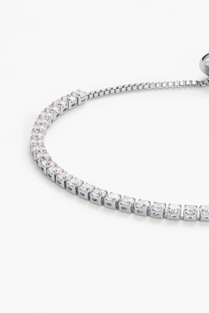 Nikki tennis bracelet - silver-Zafino-Meet our Nikki Tennis Bracelet – an exquisite blend of timeless elegance and comfort. This bracelet features a classic design with sparkling stones, exuding a refined charm. What sets Nikki apart is its adjustable design, ensuring the perfect fit for any wrist. Elevate your style effortlessly with the Nikki Tennis Bracelet, a versatile accessory that adds a touch of sophistication to every occasion. Metal: Silver Rhodium Plated on BrassDimensions: AdjustableWater Resist
