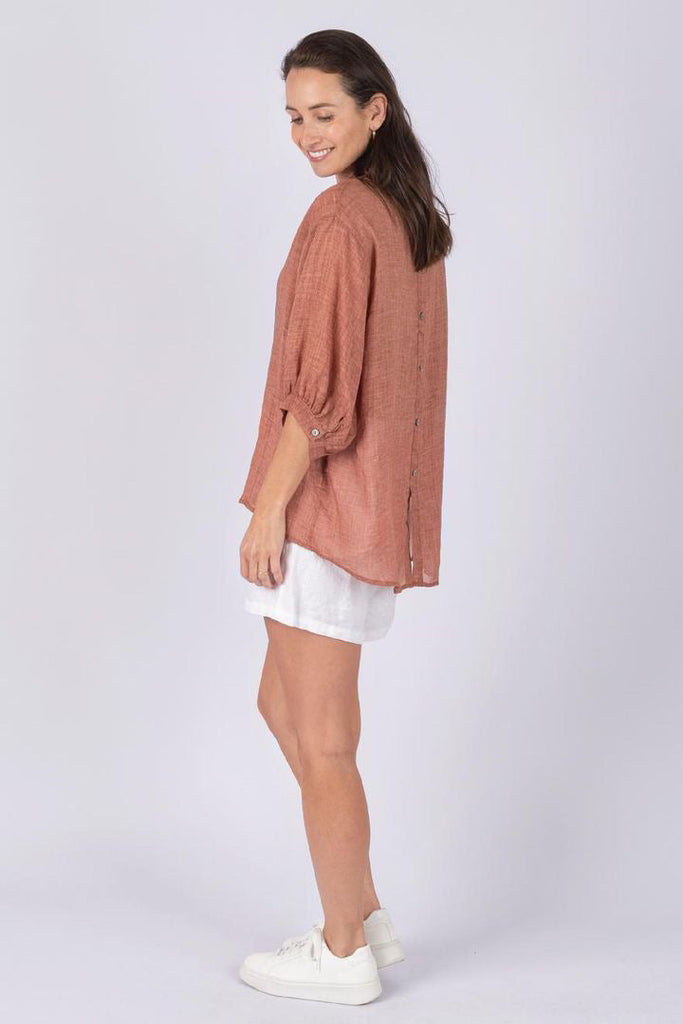 Nikola linen shirt - clay-Pash + Evolve-Nikola is always on Demand, in fact you will want to own her in every colour. This top is super easy to wear, and the most flattering fit on. Easily dress her up or down. * Button up front & back * Short sleeves * hi-low hemline * 100% Linen-Pash + Evolve