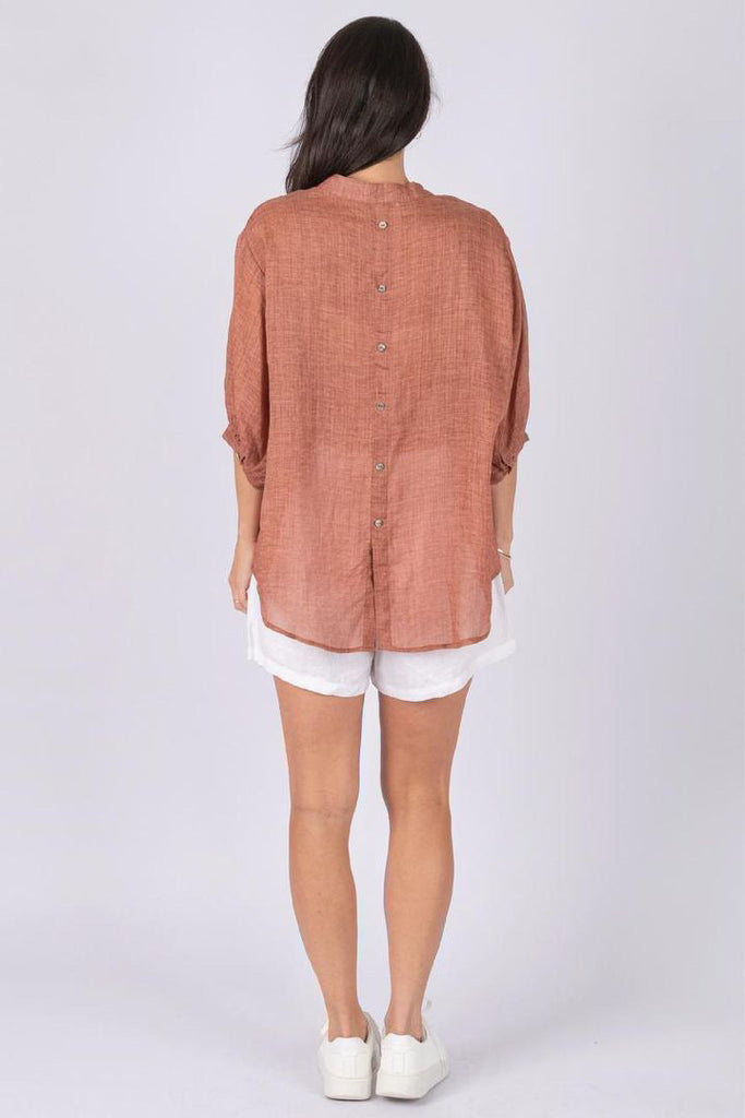 Nikola linen shirt - clay-Pash + Evolve-Nikola is always on Demand, in fact you will want to own her in every colour. This top is super easy to wear, and the most flattering fit on. Easily dress her up or down. * Button up front & back * Short sleeves * hi-low hemline * 100% Linen-Pash + Evolve