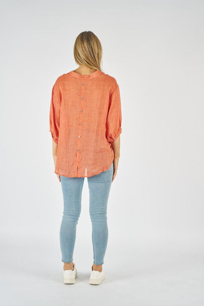 Nikola linen shirt - orange-Pash + Evolve-Nikola is always on Demand, in fact you will want to own her in every colour. This top is super easy to wear, and the most flattering fit on. Easily dress her up or down. * Button up front & back * Short sleeves * hi-low hemline * 100% Linen-Pash + Evolve