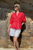 Nikola shirt - Cherry Red-Pash + Evolve-Nikola is always on Demand, in fact you will want to own her in every colour. This top is super easy to wear, and the most flattering fit on. Easily dress her up or down. * Button up front & back * Short sleeves * hi-low hemline * 100% Linen-Pash + Evolve