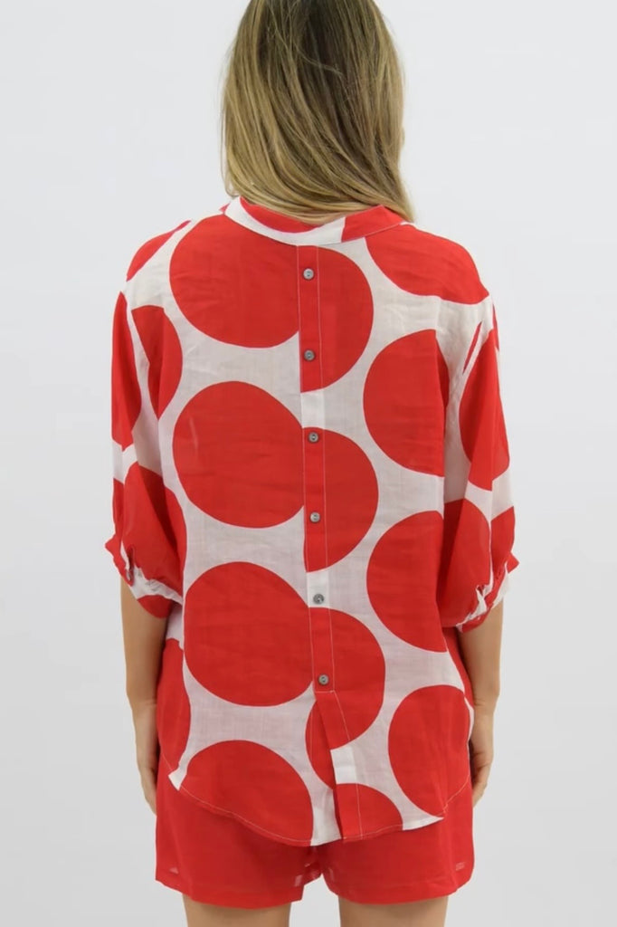 Nikola shirt - red spot-Pash + Evolve-Our best selling Nikola shirt, now in spots! This top is super easy to wear, and the most flattering fit on. Easily dress her up or down. * Button up front & back * Short sleeves * hi-low hemline * 100% Linen-Pash + Evolve