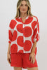 Nikola shirt - red spot-Pash + Evolve-Our best selling Nikola shirt, now in spots! This top is super easy to wear, and the most flattering fit on. Easily dress her up or down. * Button up front & back * Short sleeves * hi-low hemline * 100% Linen-Pash + Evolve