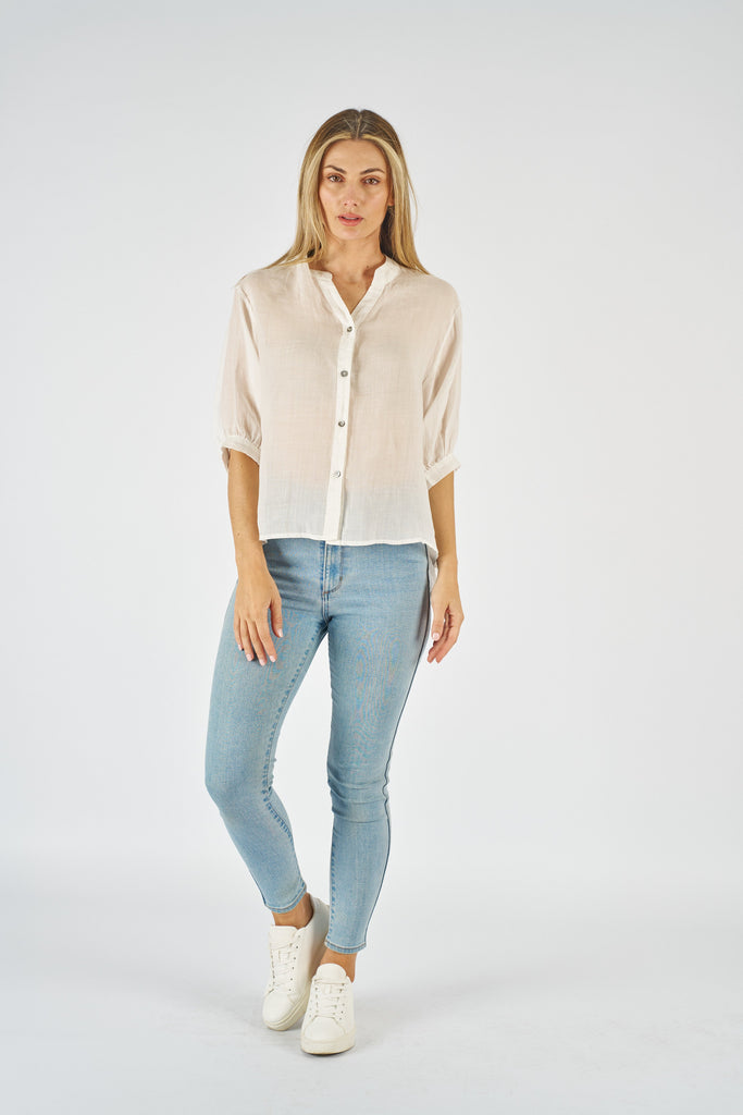 Nikola shirt - white-Pash + Evolve-Nikola is always on Demand, in fact you will want to own her in every colour. This top is super easy to wear, and the most flattering fit on. Easily dress her up or down. * Button up front & back * Short sleeves * hi-low hemline * 100% Linen-Pash + Evolve