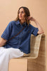 Noa Short Sleeve Shirt - fresh indigo-Ceres Life-Made from mid weight rigid denim Contains 39% TENCEL™ Lyocell fibers which are produced from responsibly sourced and processed wood pulp. TENCEL™ Lyocell and Modal fibers are naturally soft and smooth to the touch Hip length with side splits 2 piece collar with slightly curved points Patch pockets with logo embroidery detail-Pash + Evolve