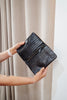 Noa wallet - black-Baleka Leather-Sleek, functional, and effortlessly modern — the Noa Wallet is designed to keep your essentials beautifully organized. It features a magnetic closure for a smooth, secure snap and a back zip pocket for quick-access items. Inside, you’ll find a thoughtfully designed layout with an internal zip compartment, 2 note dividers, and 16 card slots The Noa Wallet combines practicality with a minimalist aesthetic, making it the perfect accessory for wherever your day takes you. Magn