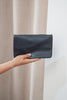 Noa wallet - navy blue-Baleka Leather-Sleek, functional, and effortlessly modern — the Noa Wallet is designed to keep your essentials beautifully organized. It features a magnetic closure for a smooth, secure snap and a back zip pocket for quick-access items. Inside, you’ll find a thoughtfully designed layout with an internal zip compartment, 2 note dividers, and 16 card slots The Noa Wallet combines practicality with a minimalist aesthetic, making it the perfect accessory for wherever your day takes you. 
