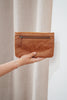Noa wallet - vintage tan-Baleka Leather-Sleek, functional, and effortlessly modern — the Noa Wallet is designed to keep your essentials beautifully organized. It features a magnetic closure for a smooth, secure snap and a back zip pocket for quick-access items. Inside, you’ll find a thoughtfully designed layout with an internal zip compartment, 2 note dividers, and 16 card slots The Noa Wallet combines practicality with a minimalist aesthetic, making it the perfect accessory for wherever your day takes you.