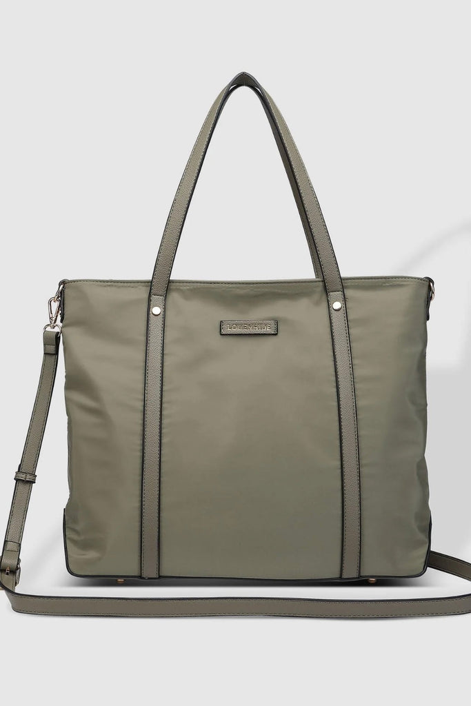 Nora Nylon Tote Bag - Khaki-Louenhide-The Louenhide Nora Khaki Nylon Tote Bag is the perfect combination of practicality and style. With its spacious interior, this tote bag is perfect for carrying your daily essentials. It features one zip pocket and two slip pockets in the main compartment, as well as a backside zip pocket and feet on the base to keep your belongings safe and secure. The backside suitcase sleeve allows you to easily attach the tote to your luggage for added convenience. The adjustable and