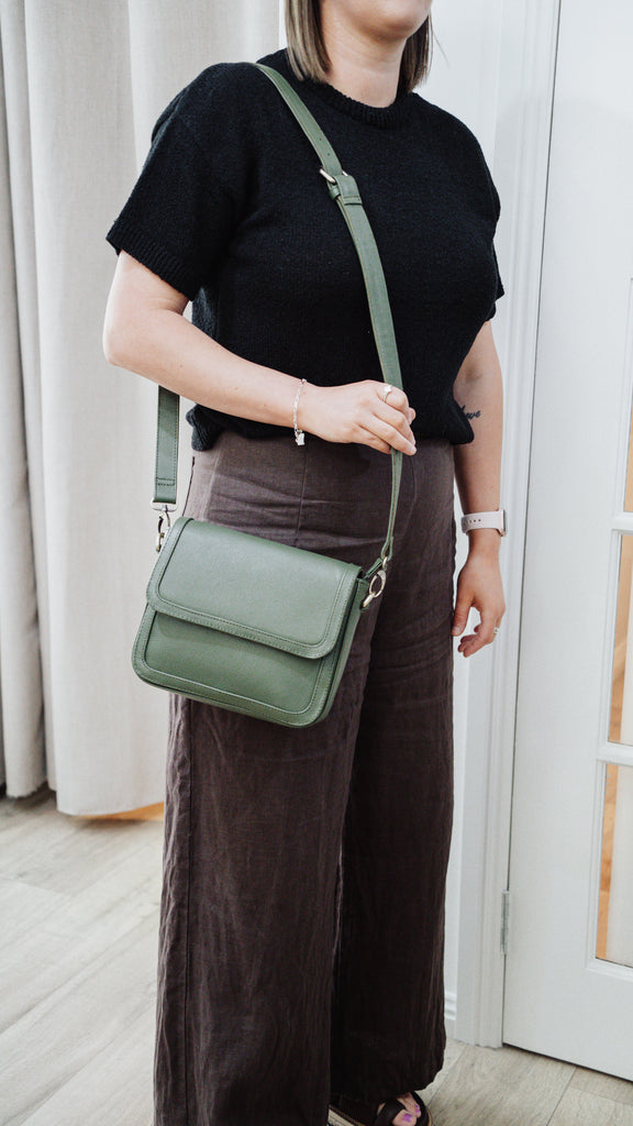 Nova bag - olive green pebble-Baleka Leather-Sleek, modern & effortlessly versatile - the Nova bag is designed to elevate your everyday style. Its contemporary shape makes it the perfect accessory for any occasion, while thoughtful details ensure both form and function. The press stud button closure opens to a fully lined interior with an internal zip pocket and slip pocket to keep your essentials neatly organised. The adjustable strap allows for comfortable wear crossbody or over the shoulder - practical b