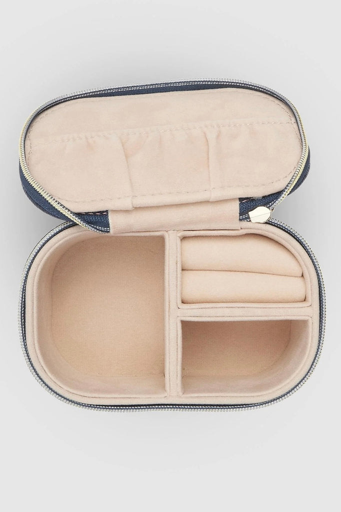 Olive Jewellery Box - Navy-Louenhide-The Louenhide Olive Navy Jewellery Box is a sweet oblong accessories box perfect for travel or everyday use. Keep your jewellery safe and secure in Olive Navy's separate compartments, elasticated pocket, and ring rolls. This affordable jewellery case is versatile and will fit comfortably in your handbag for on-the-go styling! Internal Features 2 Ring Rolls, Elastic Slip Pocket, 2 Compartments Internal Lining Faux Suede Nude 100% Lining Closure Secure Zip Body Material Po