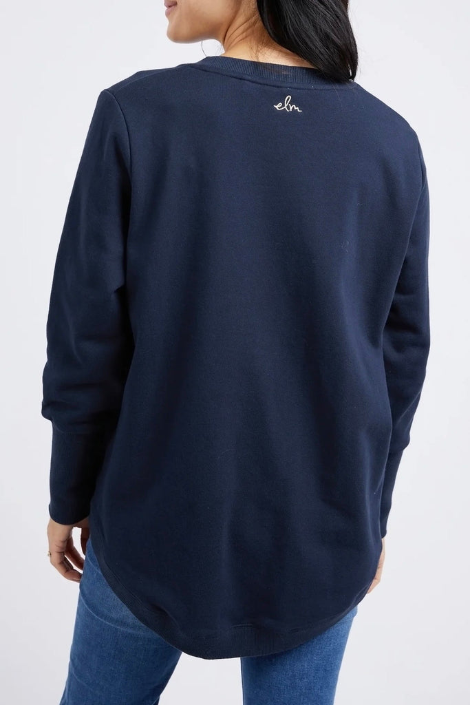 Panorama Crew - Dark Sapphire-Elm-Featuring an exclusive Elm print on the front this classic navy crew will fit seamlessly into your wardrobe this season. The extra wide cuffs and scooped hem provide the ultimate in flattering style and make this crew perfect for everyday wear. EXCLUSIVE ELM PRINT WIDE RIB CUFFS SCOOPED HEM Unbrushed Cotton Fleece-Pash + Evolve