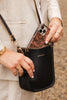 Parker Phone Crossbody Bag - Black-Louenhide-The Louenhide Parker Black Phone Crossbody Bag effortlessly combines an elevated aesthetic with everyday functionality. Whether you are heading to the office, running errands or meeting friends for coffee, this minimalistic phone bag will be your new go-to. Parker Black features an on-trend and modern portrait bag silhouette, enhanced by the contrasting stitch details in two classic colourways. Elevate your style with the adjustable webbing guitar strap or keep 