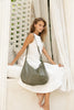 Peyton bag - Olive green-Baleka Leather-Effortless style meets everyday function. Peyton is softly sculpted for a relaxed modern silhouette that moves with you. Featuring a secure back zip pocket, internal zip compartments and internal slip pockets to keep your essentials organised. Wear it crossbody or over the shoulder with the adjustable strap. Fully lined with quality finished throughout, Peyton is the kind of bag you will reach for daily - Super practical & effortlessly elegant. A modern essential, de