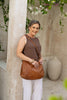 Peyton bag - Vintage Tan-Baleka Leather-Effortless style meets everyday function. Peyton is softly sculpted for a relaxed modern silhouette that moves with you. Featuring a secure back zip pocket, internal zip compartments and internal slip pockets to keep your essentials organised. Wear it crossbody or over the shoulder with the adjustable strap. Fully lined with quality finished throughout, Peyton is the kind of bag you will reach for daily - Super practical & effortlessly elegant. A modern essential, de