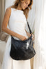 Peyton bag - black-Baleka Leather-Effortless style meets everyday function. Peyton is softly sculpted for a relaxed modern silhouette that moves with you. Featuring a secure back zip pocket, internal zip compartments and internal slip pockets to keep your essentials organised. Wear it crossbody or over the shoulder with the adjustable strap. Fully lined with quality finished throughout, Peyton is the kind of bag you will reach for daily - Super practical & effortlessly elegant. A modern essential, designed
