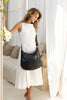 Peyton bag - black-Baleka Leather-Effortless style meets everyday function. Peyton is softly sculpted for a relaxed modern silhouette that moves with you. Featuring a secure back zip pocket, internal zip compartments and internal slip pockets to keep your essentials organised. Wear it crossbody or over the shoulder with the adjustable strap. Fully lined with quality finished throughout, Peyton is the kind of bag you will reach for daily - Super practical & effortlessly elegant. A modern essential, designed
