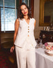 Peyton vest - vintage white-Foxwood-Add a touch of laid-back cool with the Peyton Vest. Crafted from a breezy linen blend, it features a flattering V neckline, three front buttons, and chic faux pockets for effortless style. Perfect for layering and taking your look to the next level. Front placket opening Faux welt pockets Relaxed fit 55% Linen 45% Viscose Model is wearing a size 10-Pash + Evolve