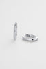 Pia hoop small - silver-Zafino-The Pia Small Hoop Earrings are a classic silver huggie hoop designed for effortless everyday wear and modern layering. Featuring a smooth, rounded silhouette with a high-shine finish, these minimalist silver hoops add a refined, understated touch to any jewellery stack. Perfect for stacking or wearing solo, they’re a timeless staple for both everyday styling and elevated looks. Metal: Silver Plated on Brass baseDimensions: 8.4mm (W) x 12mm (L)Water Resistant: Handle occasion