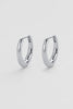 Pia hoop small - silver-Zafino-The Pia Small Hoop Earrings are a classic silver huggie hoop designed for effortless everyday wear and modern layering. Featuring a smooth, rounded silhouette with a high-shine finish, these minimalist silver hoops add a refined, understated touch to any jewellery stack. Perfect for stacking or wearing solo, they’re a timeless staple for both everyday styling and elevated looks. Metal: Silver Plated on Brass baseDimensions: 8.4mm (W) x 12mm (L)Water Resistant: Handle occasion