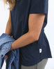 Pima Vee Tee - Navy-Elm-A true Elm favourite, the Pima Vee Tee is crafted from luxuriously soft pima cotton jersey. Finished with a flattering V-neck and raw edge detailing, it's an everyday essential you'll wear with everything. Everyone's favourite tee Raw Edge Detail on Neckline & Sleeve Vee Neckline Relaxed fit 100% pima cotton jersey The Model is 173cm and is wearing a size 10-Pash + Evolve