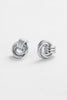 Poppy earring - Silver-Zafino-Introducing the Poppy Earrings – chic studs with a mesmerising braided design. Combining timeless elegance and contemporary style, these lightweight earrings elevate any look. The intricately braided pattern adds sophistication to your ensemble, making the Poppy Earrings your go-to for understated charm on any occasion. Metal: Silver Rhodium Plated on BrassDimensions: 14mm x 17mmWater Resistant: Splash proof, not recommended to be worn in the ocean or pool-Pash + Evolve