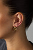 Poppy earring - gold-Zafino-Introducing the Poppy Earrings – chic studs with a mesmerising braided design. Combining timeless elegance and contemporary style, these lightweight earrings elevate any look. The intricately braided pattern adds sophistication to your ensemble, making the Poppy Earrings your go-to for understated charm on any occasion. 18K Gold Plated Solid Brass Base 14mm (w) x 17mm (L) Splash Proof: Splashes or occasional water contact-Pash + Evolve