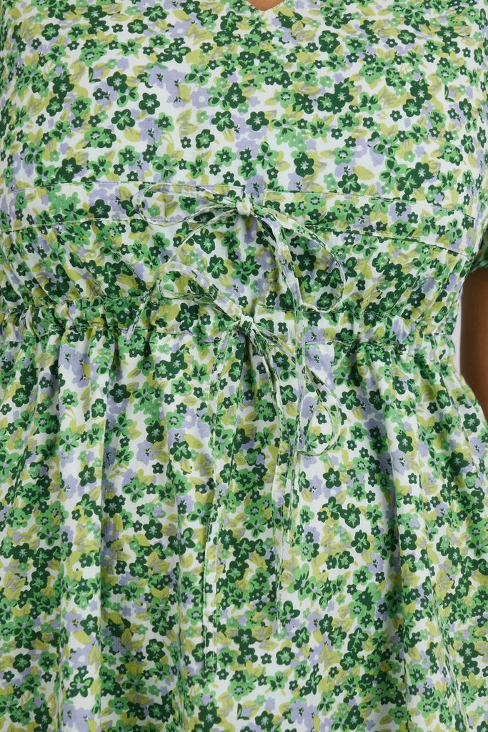 Prairie floral dress - green-Elm-Crisp And as Cute as Can Be, The Prairie Floral Dress in Fresh Cotton Voile Fabric Is Light and Easy to Wear. Featuring Shirred Cuffs and a Double Tie Waist for Extra Comfort This Pretty Ditsy Dress Is a Joy to Wear This Season. Elm Exclusive Print Flattering Double Tie Waistband Vee Neckline & Shirred Cuffs Cotton Voile Model is 169cm and wears Size 10-Pash + Evolve