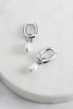 Prue Earring - Silver-Zafino-These earrings feature a stunning freshwater pearl gracefully hanging from a gold oval hoop, creating an elegant and refined design.The combination of the radiant pearl and the sleek gold oval hoop creates a perfect harmony of classic and modern aesthetics. Metal: Silver Rhodium Plated on BrassDimensions: 7mm x 30mmWater Resistant: Splash proof, not recommended to be worn in the ocean or pool Water resistant Hypoallergenic & Nickel Free Female Founded & Family Owned-Pash + Evol